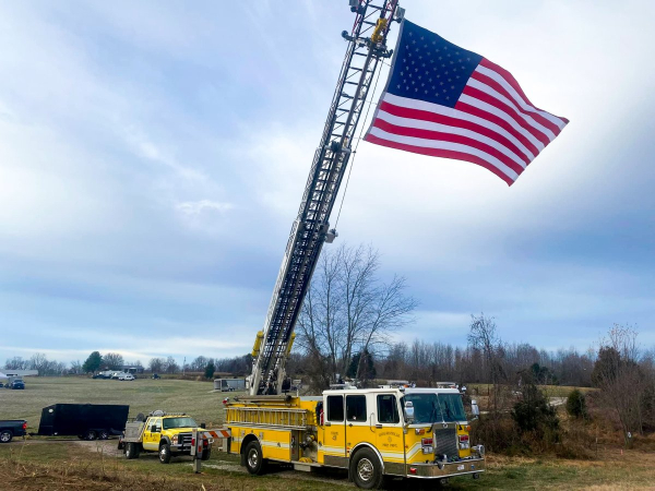 The Richardsville Fire Department displays the American flag from their ladder truck at The Hayward Minton Thunderfest.