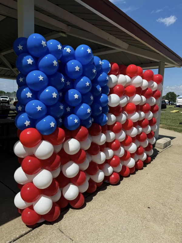 A festive balloon display in red, white, and blue brings patriotic flair to The Hayward Minton Thunderfest! 