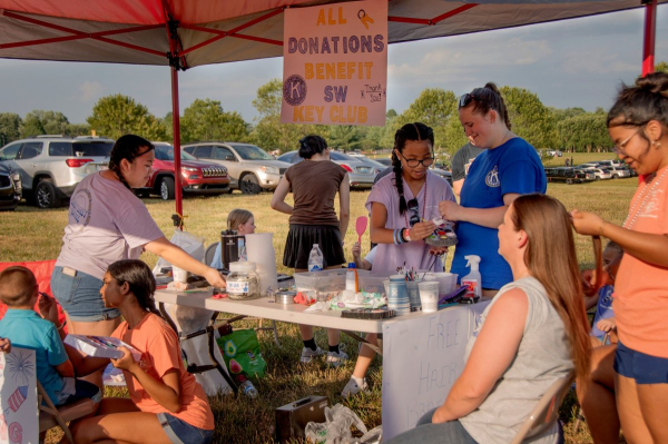 Volunteers from the South Warren Key Club offer face painting and hair braiding, with all donations supporting their program.